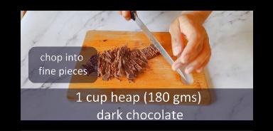 chopping the dark chocolate using knife