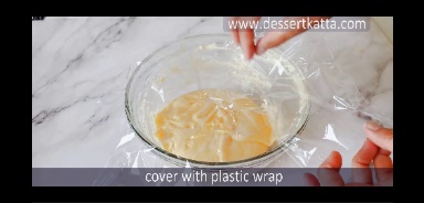 covering the batter with plastic wrap