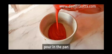 red velvet cake batter is added to prepared baking pan