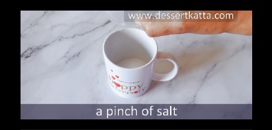 salt is added to the mug to make vanilla mug cake