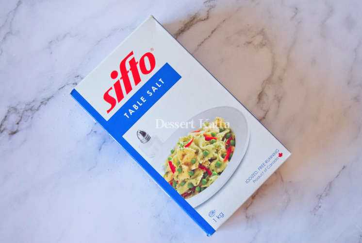 sifto table salt 1 kg box is placed on marble surface