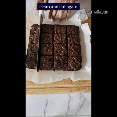 cutting the brownie slab in to 16 pieces.