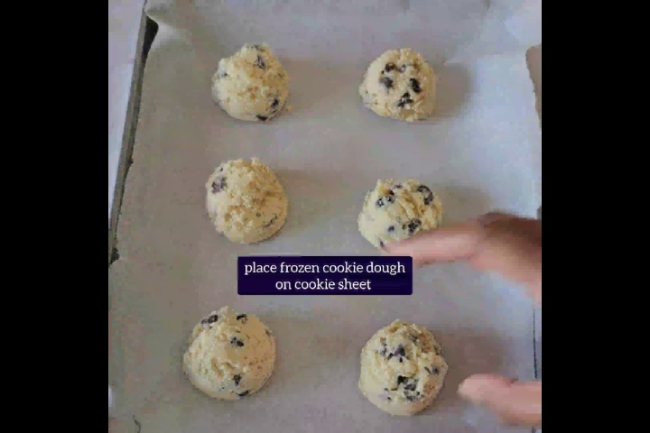 frozen cookie dough is placed on parchment paper