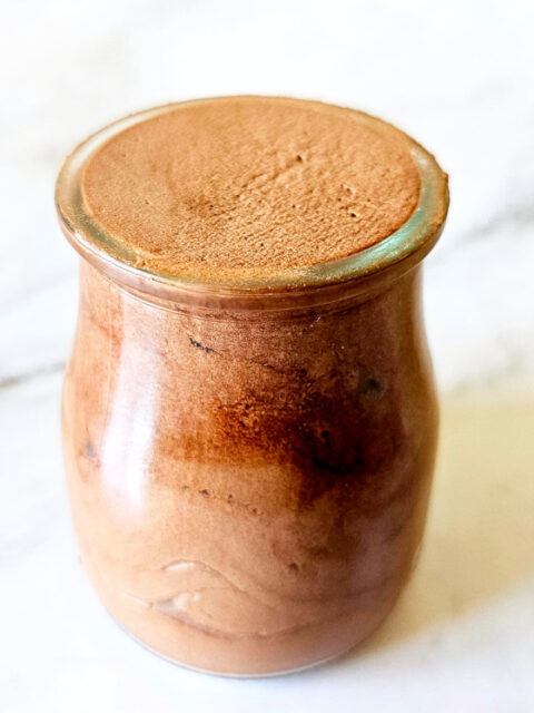 chocolate mousse made with cocoa powder placed in serving glass