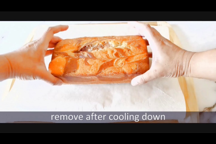 removing the marble loaf cake from pan after cooling down