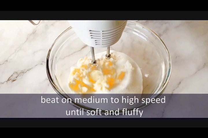 butter and sugar in mixed using hand beater to make the loaf