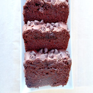 3 slices of banana chocolate loaf cake placed on white place