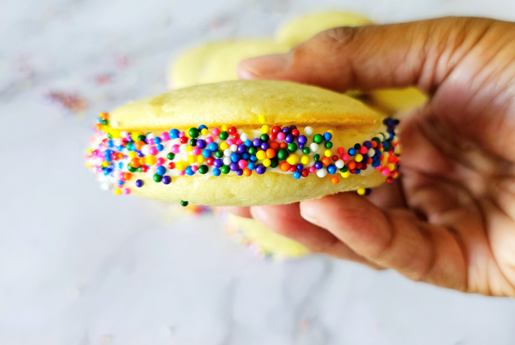 single whoopie pie holding in hand