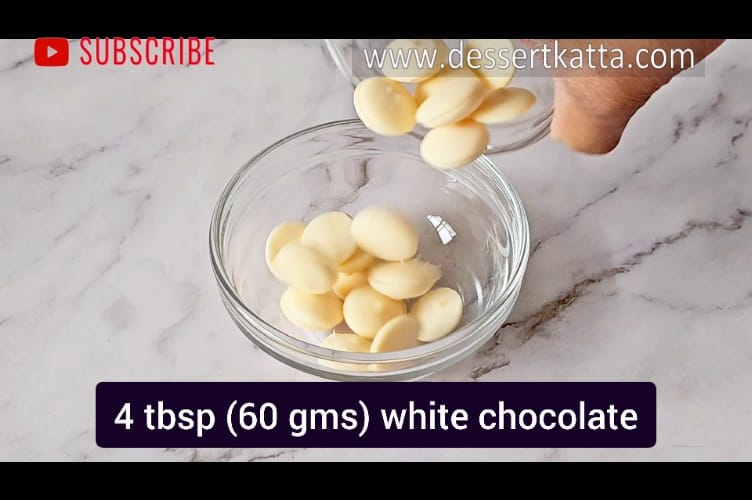 adding 60 grams of white chocolate to microwave safe bowl to make copycat recipe of Starbucks white chocolate mocha