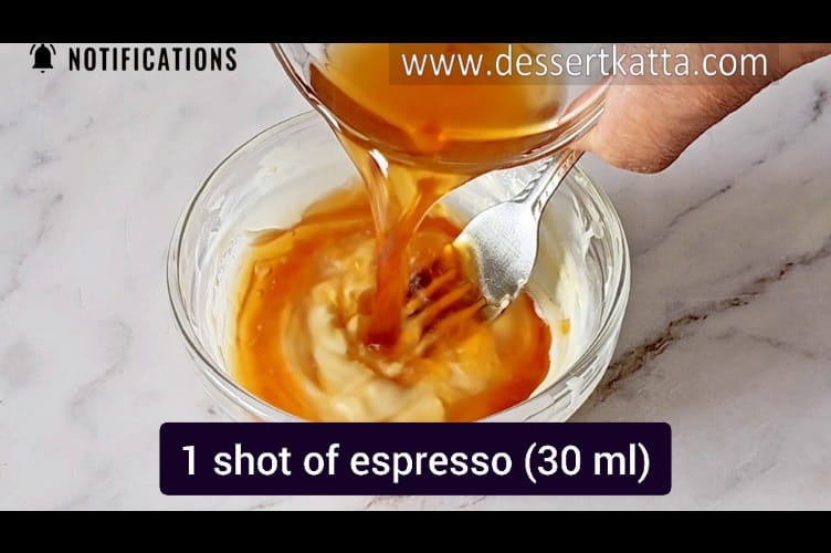 adding 1 espresso shot to melted white chocolate