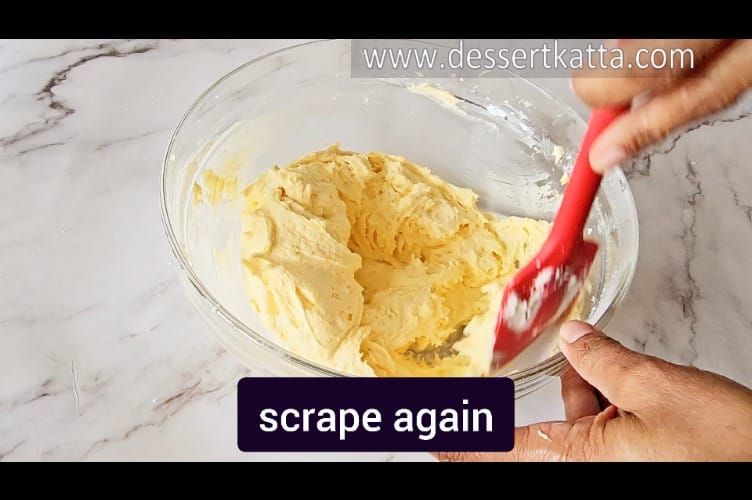 scraping mango buttercream as and when needed