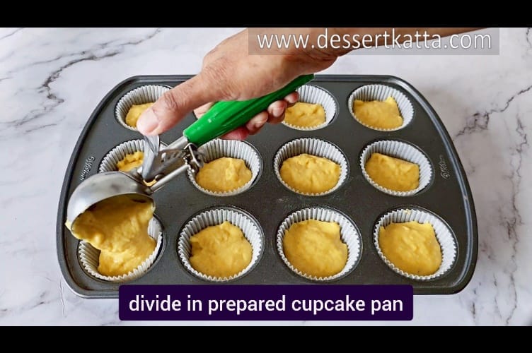 dividing cupcake batter into 12 cupcake liners