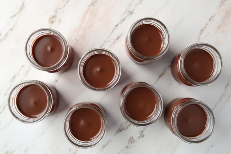 top view of chocolate mousse stored in an individual jars