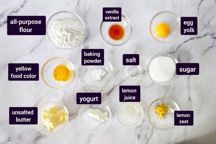 maggianos lemon cookie ingredients placed in an individual bowls on marble surface